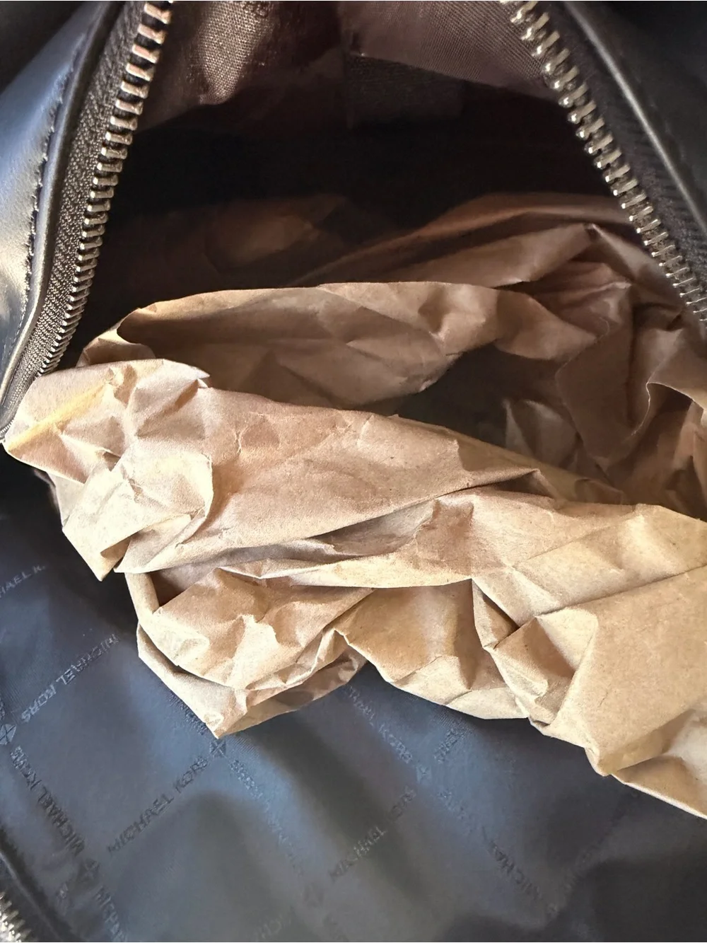 Michael Kors Black Leather Backpack with Embossed Front Pocket